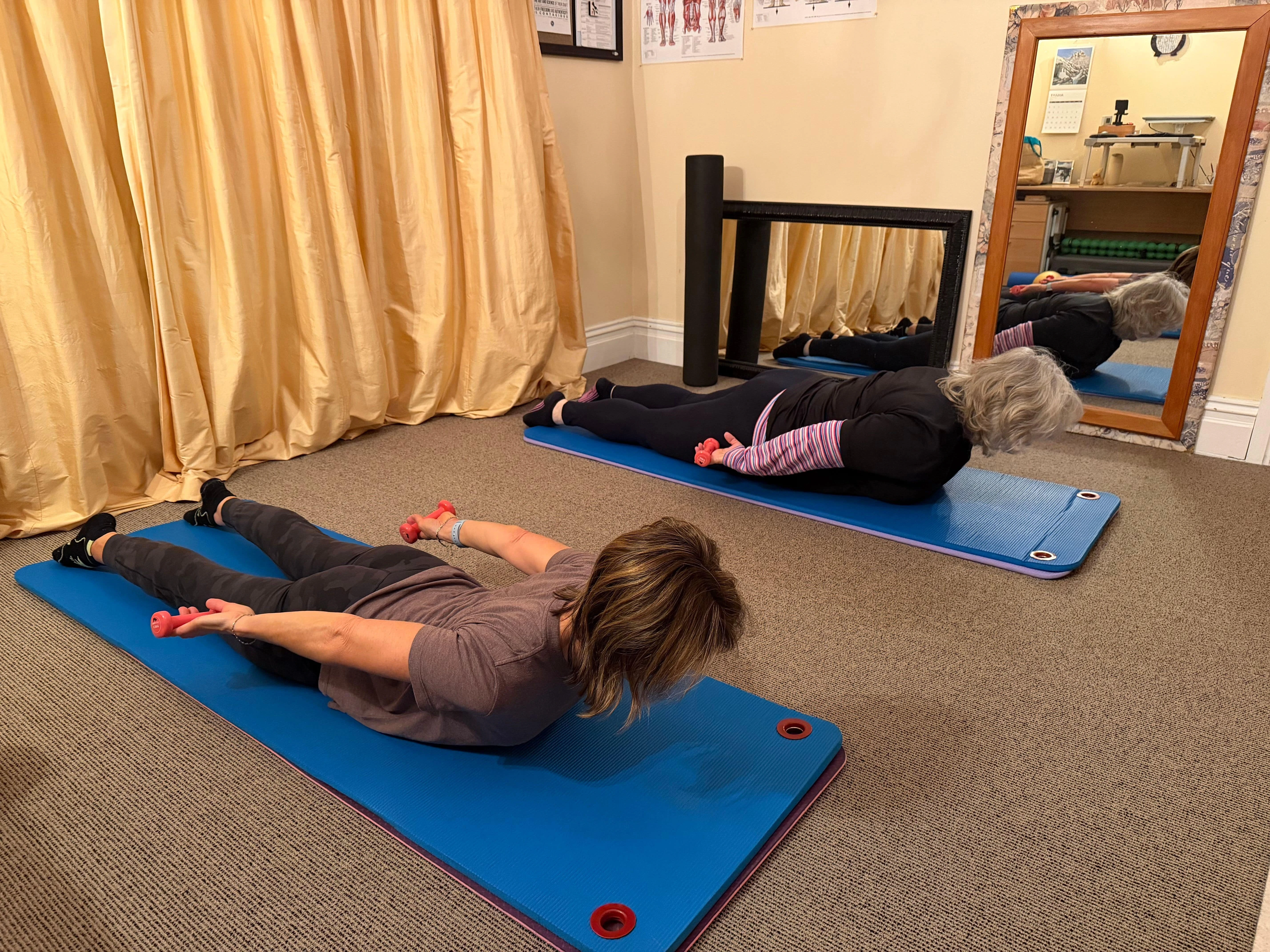 Dart exercises Students doing Pilates in studio
